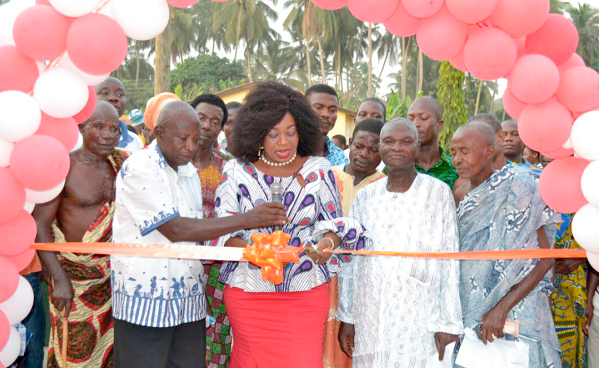 Obaatanpa Pokuah Sawyerr cutting the tape to inaugurate one of the centres