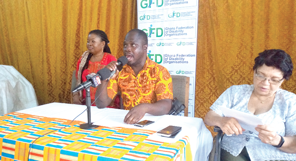 Mr Joshua Makubu (middle) explaining a point at the press conference. With him are Ms Esther Akua Gyamfi (left) and Ms Lilian Bruce-Lyle, a member of GFD.