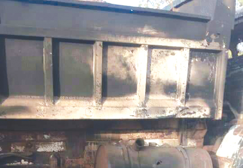 One of the burnt tipper trucks