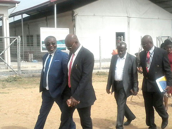 Dr Anthony Nsiah-Asare (left), the Director-General of the GHS, touring the Infectious Disease Centre at the Tema General Hospital. With him is Dr Samuel Kaba, Dr Kwabena Opoku-Adusei (2nd right), Medical Director, TGH, and other officials Picture: Benjamin Xornam Glover