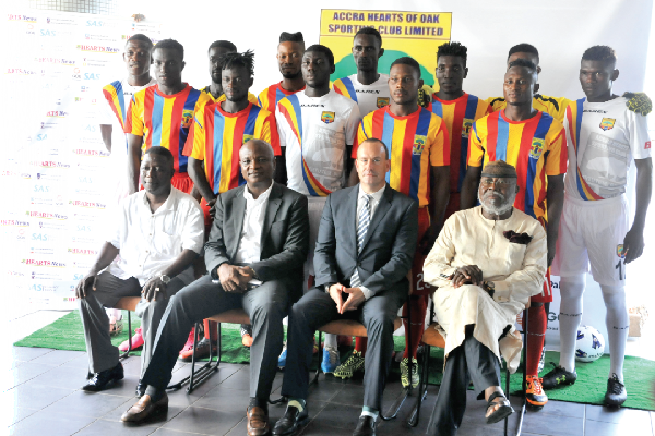 (Seated from right) Dr Nyaho Nyaho-Tamakloe, the CEO, Mark Noonan,Board Chairman, Togbe Afede XIV and Alhaji Akambi, a director, in a pose with the new players.