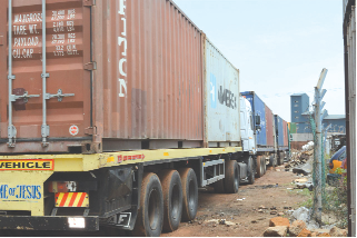 The impounded trucks at the  State Warehouse at the Tema Port.