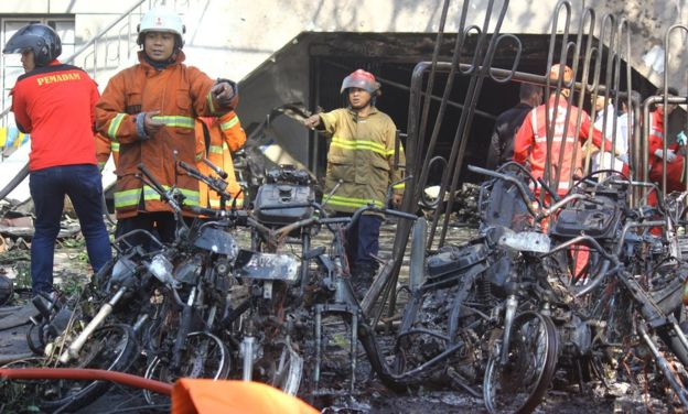Firefighters attended the scene at the Pentecost Church Central Surabaya (GPPS)