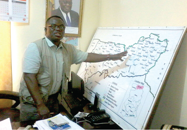 Mr Ben Dere, the Technical Director of the Ministry of National Security, explaining issues relating to the operational areas to media personnel in Bawku