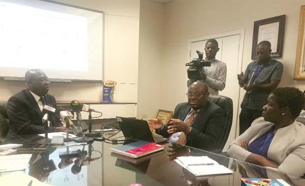 Mr Kwadwo Ntim (2nd right) explaining a point to the media. He is supported by Mr Archie Hesse (left) 