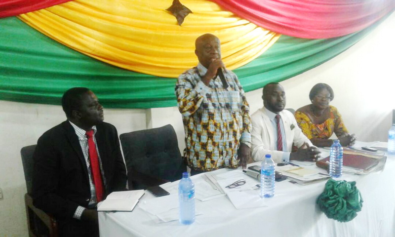 The District Chief Execute for Bosomtwe, Mr Joseph Kwasi Asuming speaking during the meeting while Deputy Minister of Education and others look on