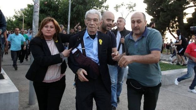 Nationalists were angry that the mayor (middle) was attending a remembrance event