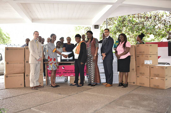     Ms Lopez-Ekra (right) presenting the items to Ms. Djaba(left)
