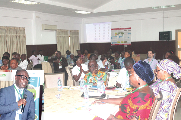  Mr Seth Osei Akoto (left), the acting Director, Directorate of Crop Services at the Ministry of Food and Agriculture (MoFA), addressing participants in the 2018 National Seed Value Chain Business Networking Forum. Picture: Maxwell Ocloo