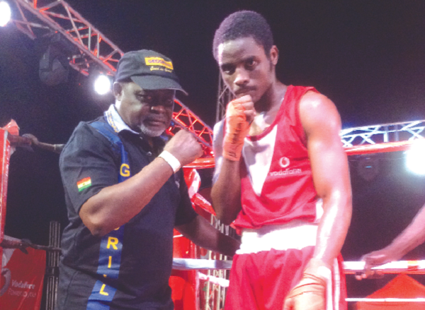 Azumah Nelson with his son, Nelson Junior