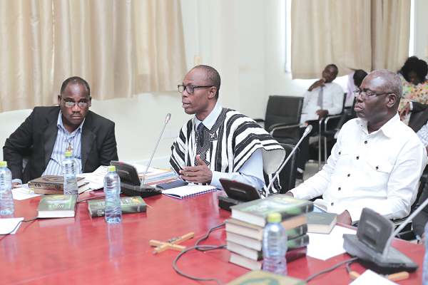 Rev Bismark A. Akandi (in smock), the Chief Internal Auditor, Ghana Education Service (GES), and other directors taking the oath when they appeared before the Public Accounts Committee (PAC) at the Parliament House conference room, Accra.
