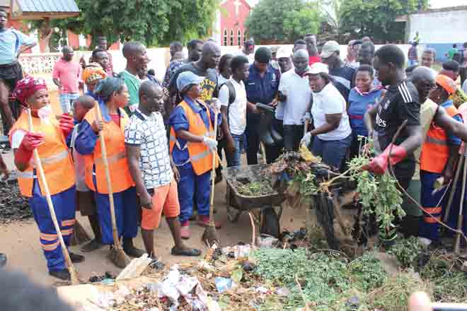 Mrs Elizabeth Afoley Quaye and some members of the community cleaning up the Nungua community. Picture: Innocent Owusu