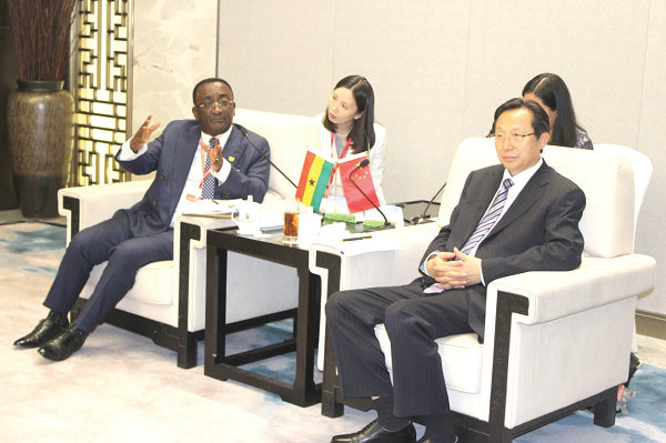 Dr Akoto (left) making a point during the courtesy call on Mr Chanfu