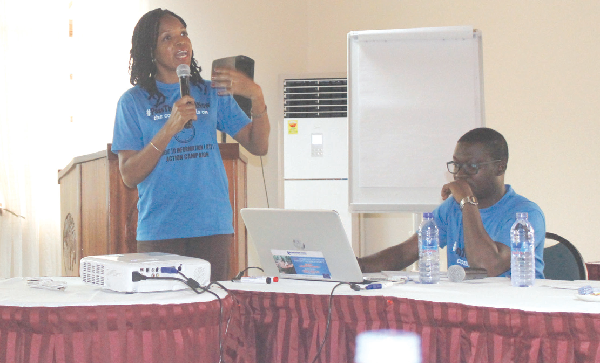  Ms Ugonna Ukaigwe (standing), a member of the Civil Society Organisations (CSOs) Platform, on the Sustainable Development Goals (SDGs), making a point