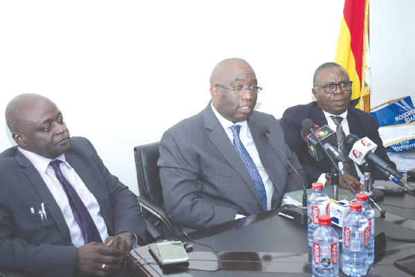 Mr Joe Ghartey (middle) addressing the bidders in  Accra. Those with him are Mr Richard Dombo Diedong (left)  Chief Executive Officer of the Ghana Railways Development Authority and Mr Kwame Adorbor (right), Chief Director of the Ministry of Railways Development. 