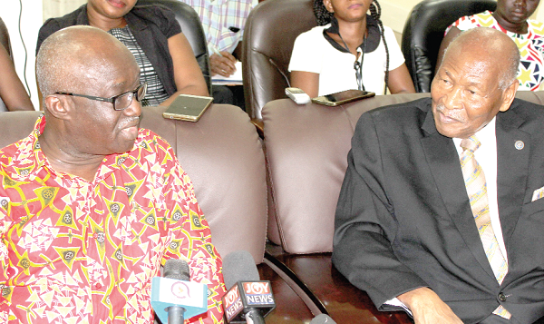 Mr Joseph Kofi Adda (left) Minister of Sanitation and Water Resource holding discussions with  Mr Sam Okudjato (right), past Rotary Internal Director. 