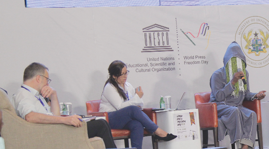 Anas Aremeyaw Anas (right), sharing his experience during the panel discussion. With him are Ms Adriana Hurtado (middle) and Mr Jeremy Dear, Moderator. 