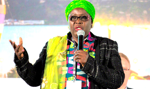 Hajia Alima Mahama, Minister of Local Government and Rural Development, addresing the forum. 