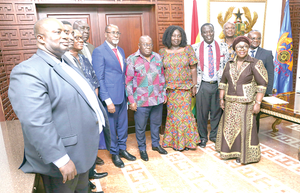 President Nana Addo Dankwa Akufo-Addo with the board members of the National Labour Commission. Picture: Samuel Tei Adano