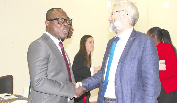 Prof Ransford Gyampo (left) interacting with Mr Paolo Salvia (right), acting head of the delegation of the European Union. Picture: INNOCENT K. OWUSU