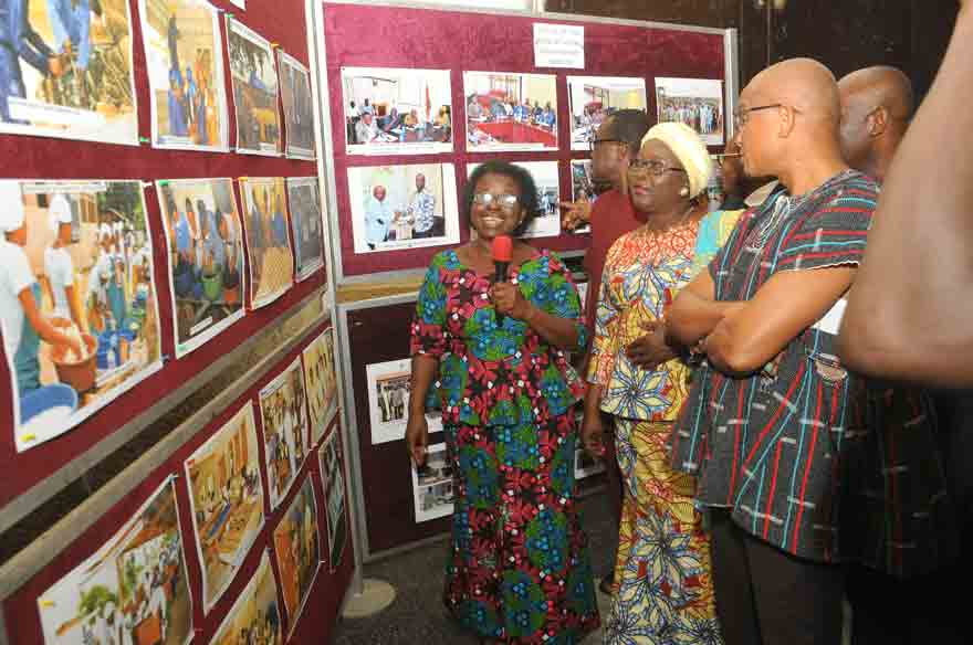 Madam Hajia Alima Mahama (2nd left) being conducted round an exhibition mounted as part of the programme. With her are Dr Mustapha Abdul-Hamid (right), the Minister of Information, and some officials of the Ministry of Local Government and Rural Development. Picture: EBOW HANSON