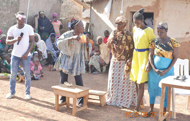 Scenes at the live stage drama in one of the communities