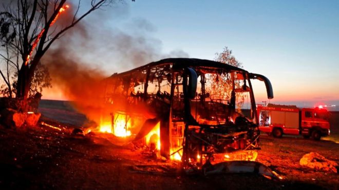 A bus in a kibbutz was set ablaze after being hit and an Israeli seriously wounded