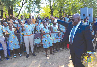 President Akufo-Addo responding to cheers from the students