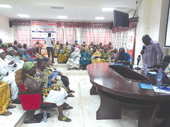 The Deputy Central Regional Minister, Mr Thomas Yaw Adjei-Baffoe, (standing) addressing the gathering