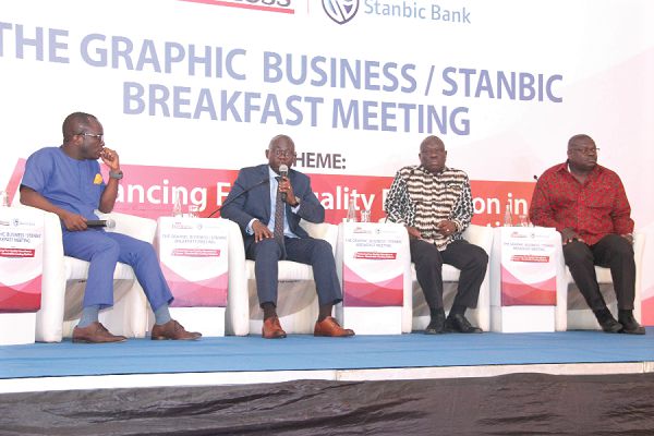 Prof Kwasi Opoku Amankwah (2nd left), Director General, Ghana Education Service, responding to questions. Looking on are Mr Evans Mensah (left), Mr Israel Titi Osei (3rd left), and Prof Ernest Aryeetey. 