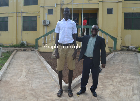 Meet Ebenezer Mensah, the 16-year-old "Goliath" of Swedru with his headmaster