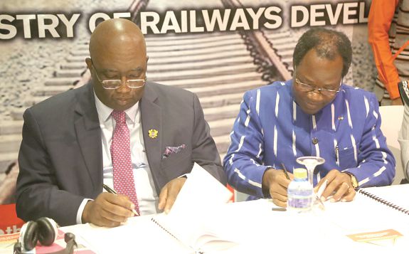 Mr Joe Ghartey (left), Minister of Railways Development, and Mr Pingrenoma Zagre, Burkina Faso Ambassador to Ghana, signing the contract. Picture: EMMANUEL ASAMOAH ADDAI