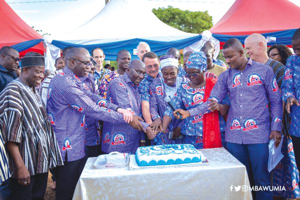 Vice President Mahamudu Bawumia (3rd left ) being assisted by some dignitaries to cut a cake to mark the 60th anniversary celebration of the centre 