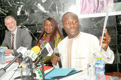 Mr Mohammed Adjei Sowah (right) launching the strategy. With him are Mr Martins Small, a consultant, and Mrs Tawia Addo-Ashong, World Bank Lead Consultant. Picture: EBOW HANSON
