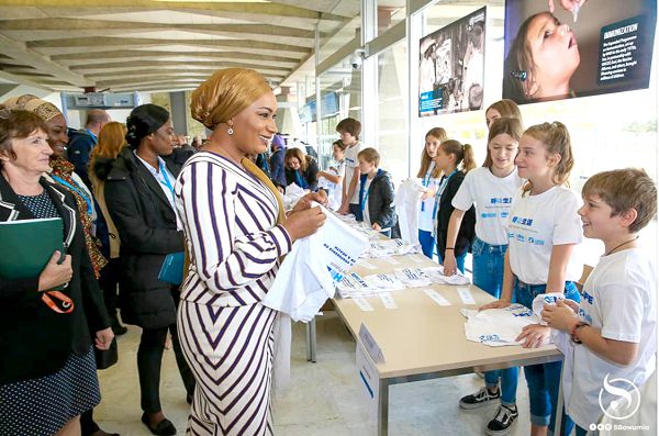 mrs samira bawumia interacting with some children int the conference