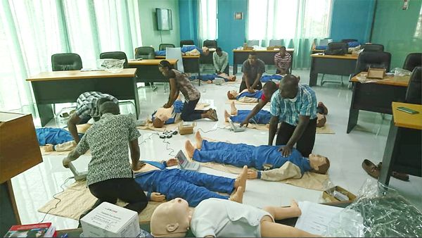  Participants being taken through the rudiments of first aid  during the training.