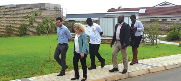  Mr Eli Slama (left) taking the Israeli Ambassador, Ms Shani Cooper, on a tour of the housing project