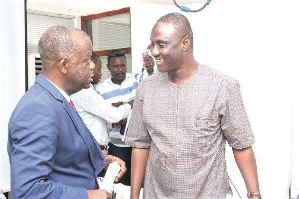  ACP (retd) K.K. Amoah, Executive Director, Economy and Organised Crime Office (EOCO) with Mr Suleiman Ahmed, Chief Director,  Ministry of Justice and Attorney General’s Department after the workshop. Picture: BENEDICT OBUOBI