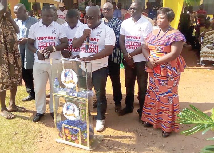 Mr Edward Owusu, the Atebubu-Amantin Municipal Chief Executive, flanked by other DCEs in the area declaring their support for the creation of the Bono East Region during the launch of the campaign