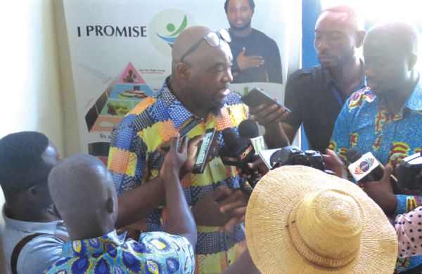  Mr Essuah-Mensah speaking to journalists after the sensitisation meeting in Sunyani