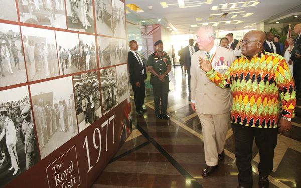 President Akufo-Addo and the Prince of Wales inspecting an exhibition at the Jubilee House in Accra. Pictures: SAMUEL TEI ADANO
