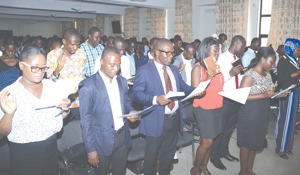 The newly employed civil servants taking an oath.Picture: GABRIEL AHIABOR