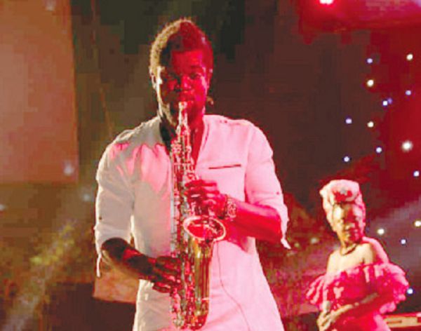 Steve Bedi on stage with Ssue. 
