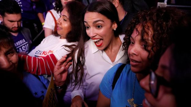 New York Democrat Alexandria Ocasio-Cortez (C) is the youngest woman ever elected to the US House at 29 years old