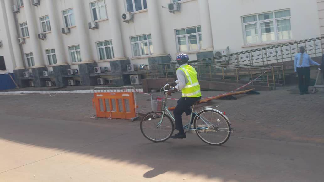 Ras Mubarak rides bike to Parliament to protest economic hardship