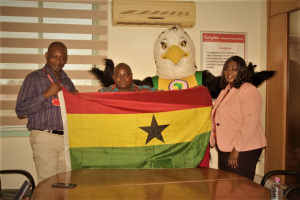 Rally around the flag: Mr Ransford Tetteh (2nd left) in a pose with LOC chairperson, Freda Prempeh (right) and the acting Editor of the Graphic Sports, Maurice Quansah, during the visit