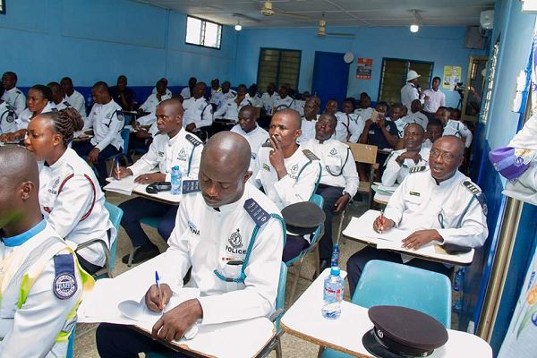 Some of the participants taking notes during the training