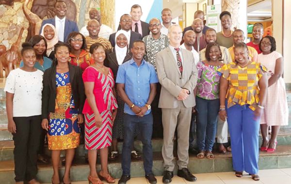  Mr Andrew Barnes (4th left) with the scholarship recipients