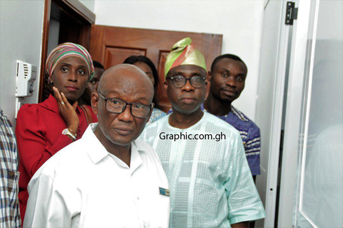 Prof Delle taking guests around the clinic