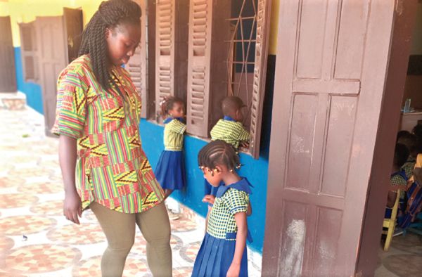  Madam Ama, makes school filled with fun for her children.